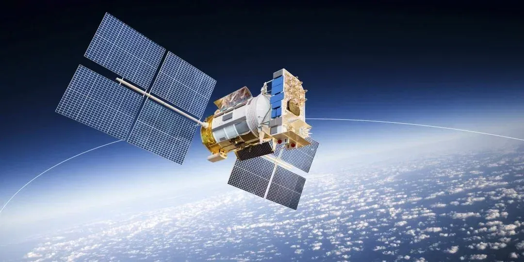A communications satellite orbiting above Earth